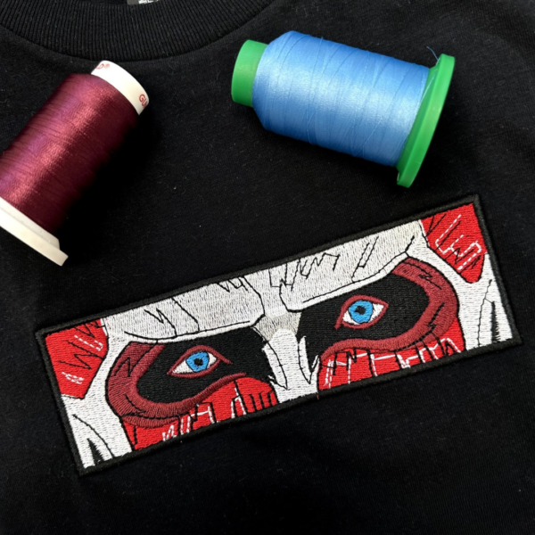 Colossal Titan Eyes Embroidery Design stitched by a customer