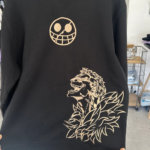 Doflamingo and Logo Embroidery Design stitched by a customer