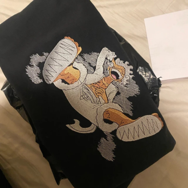 Gear 5 Laugh and Logo Embroidery Design stitched by a customer