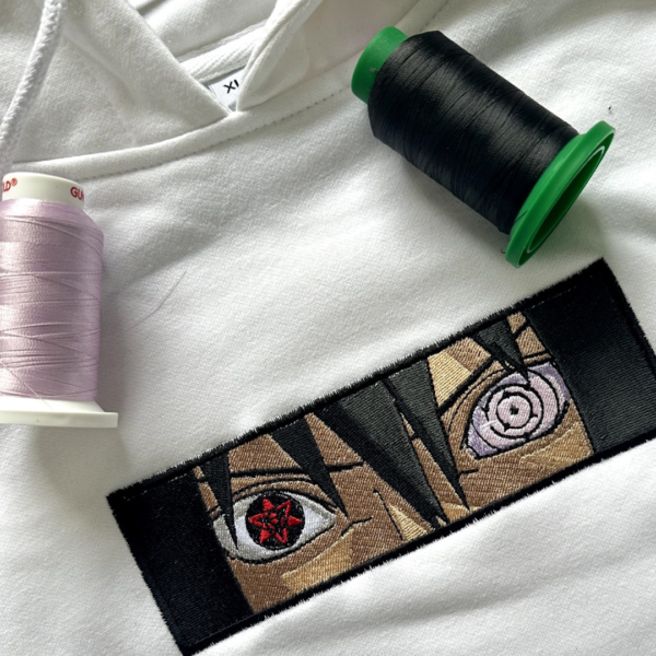 Sasuke Eyes Embroidery Design stitched by a customer