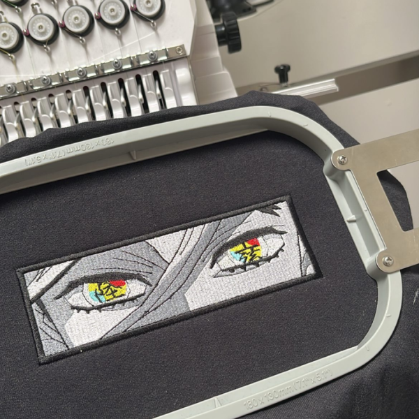 Doma Eyes Embroidery Design stitched by a customer