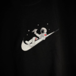 Astronaut Swoosh Embroidery Design stitched by a customer