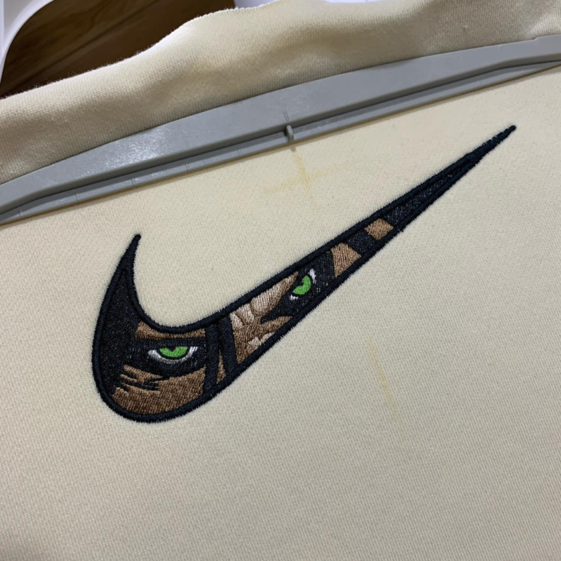 Eren Titan Eyes Swoosh Embroidery Design stitched by a customer