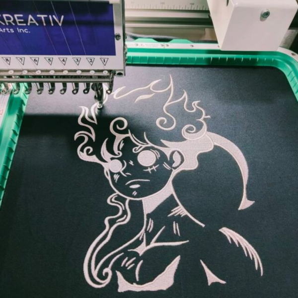 Gear 5 and Logo Embroidery Design stitched by a customer