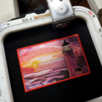 Lighthouse Sunset Embroidery Design stitched by a customer