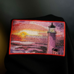 Lighthouse Sunset Embroidery Design stitched by a customer
