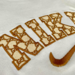 Swoosh Gucci Embroidery Design stitched by a customer
