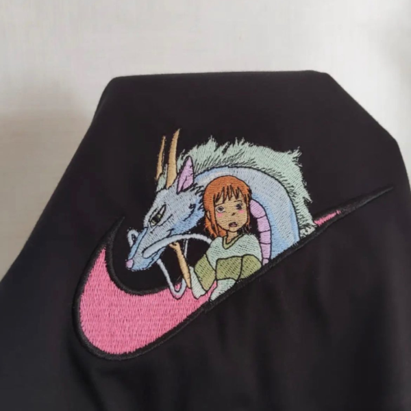 Chihiro and Haku Swoosh Embroidery Design stitched by a customer